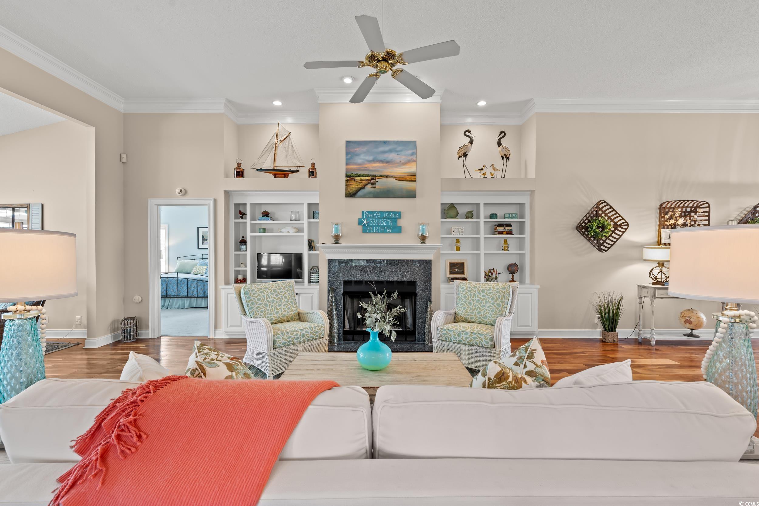 30 Baldwin Loop Pawleys Island, SC 29585 - Photo 5 of 39 Living area featuring light wood-type flooring, a