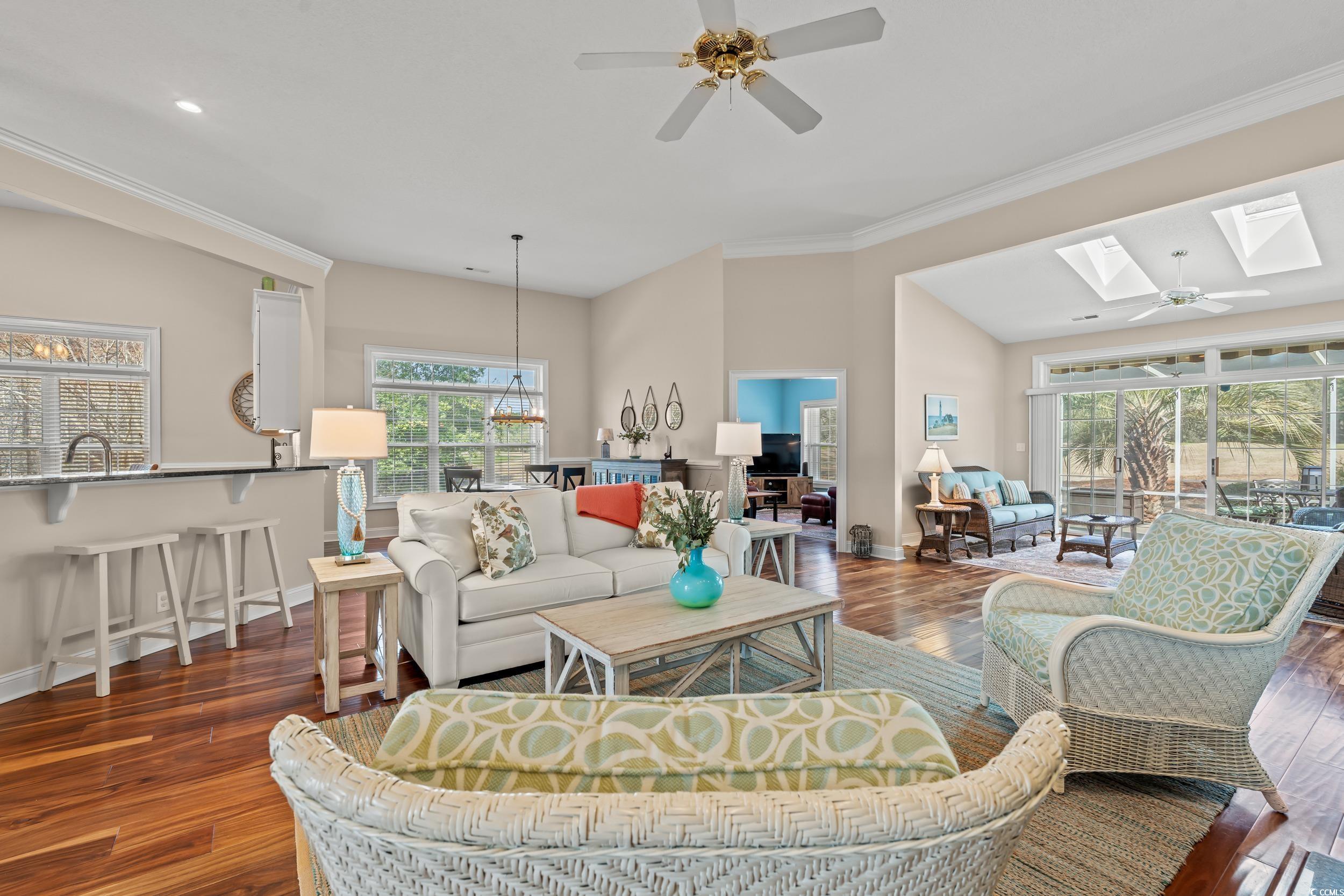 30 Baldwin Loop Pawleys Island, SC 29585 - Photo 6 of 39 Living room featuring ceiling fan with notable cha
