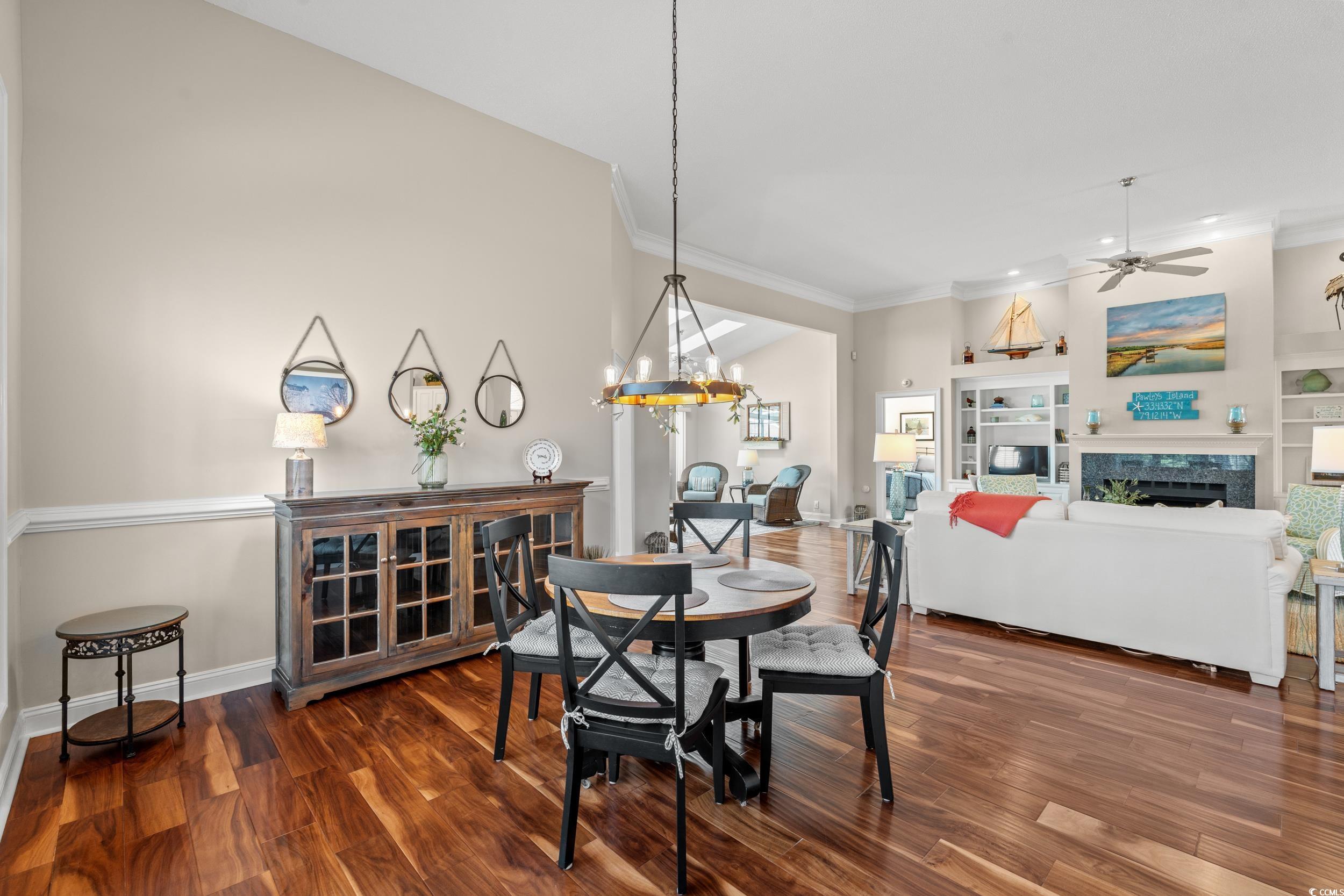 30 Baldwin Loop Pawleys Island, SC 29585 - Photo 10 of 39 Dining area with ceiling fan with notable chandeli