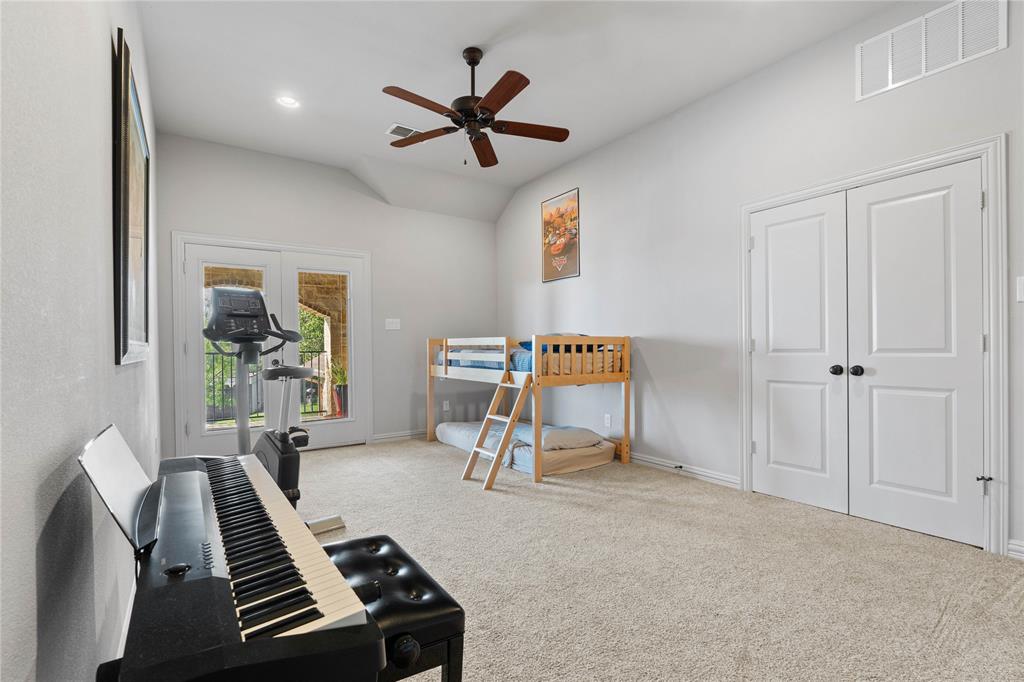 293 Harborview Drive Rockwall, TX 75032 - Photo 26 of 37 a living room with furniture and a window