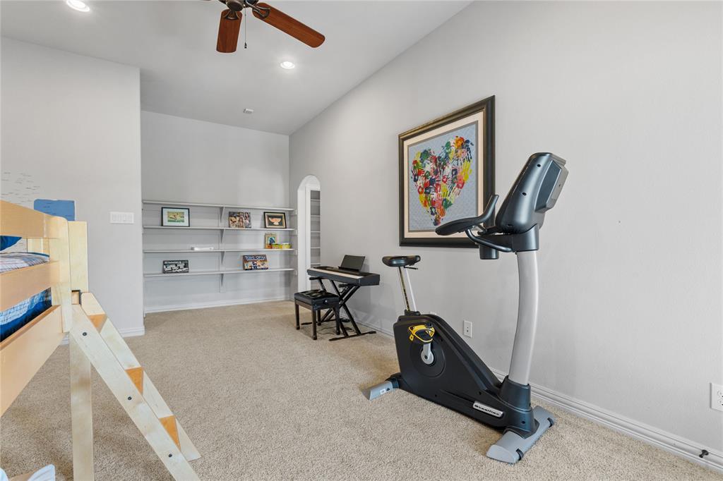 293 Harborview Drive Rockwall, TX 75032 - Photo 27 of 37 a view of a room with gym equipment