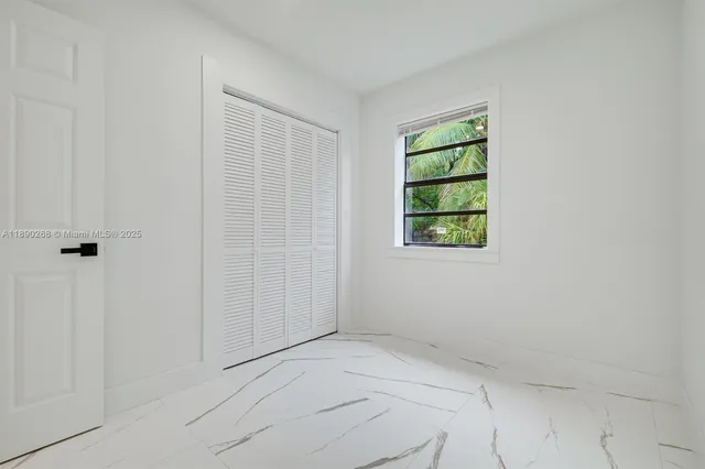 an empty room with a window