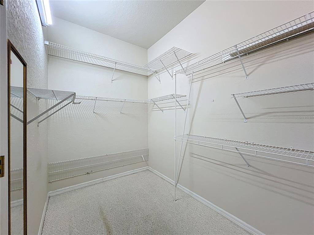 17 Sweetbay Court Homosassa, FL 34446 - Photo 27 of 61 a view of a room with racks on the wall