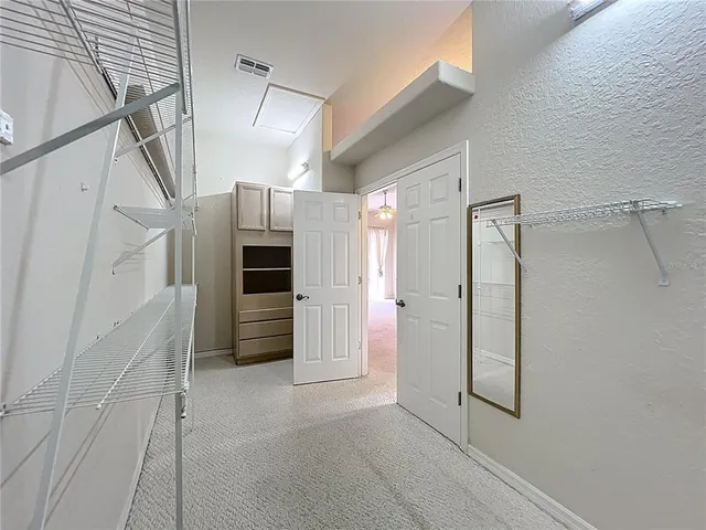 a bathroom with a sink a mirror and shower