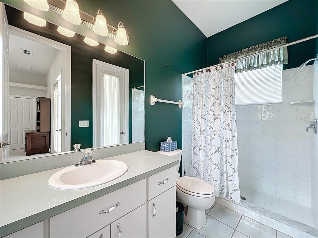 17 Sweetbay Court Homosassa, FL 34446 - Photo 40 of 61 a bathroom with a double vanity sink mirror and toilet