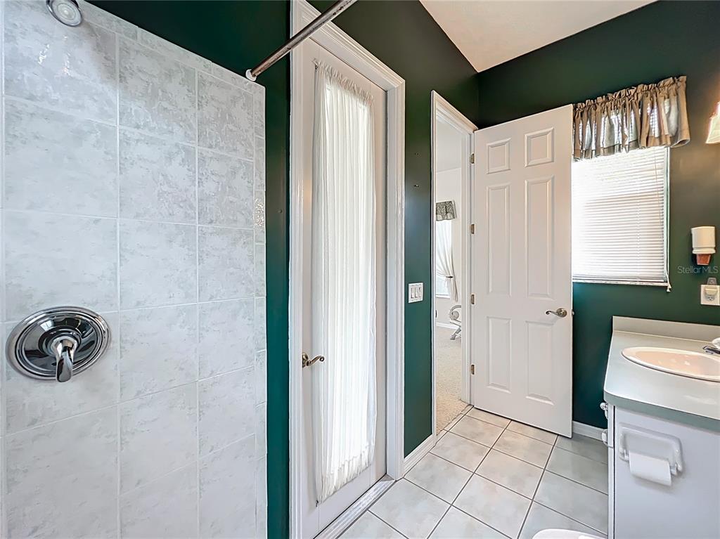 17 Sweetbay Court Homosassa, FL 34446 - Photo 41 of 61 a bathroom with a window and a shower