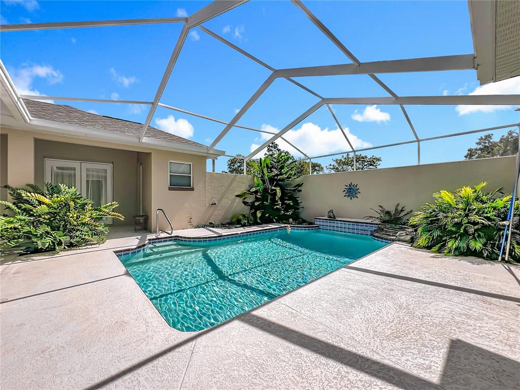 17 Sweetbay Court Homosassa, FL 34446 - Photo 47 of 61 a view of a house with a yard and potted plants