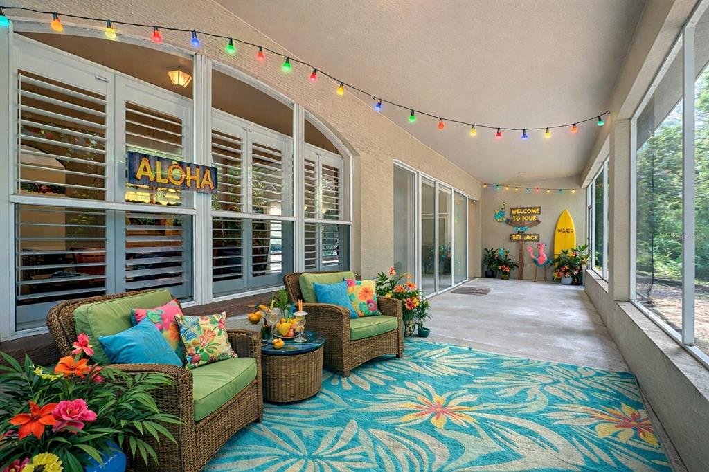 17 Sweetbay Court Homosassa, FL 34446 - Photo 49 of 61 a outdoor living space with furniture and garden view