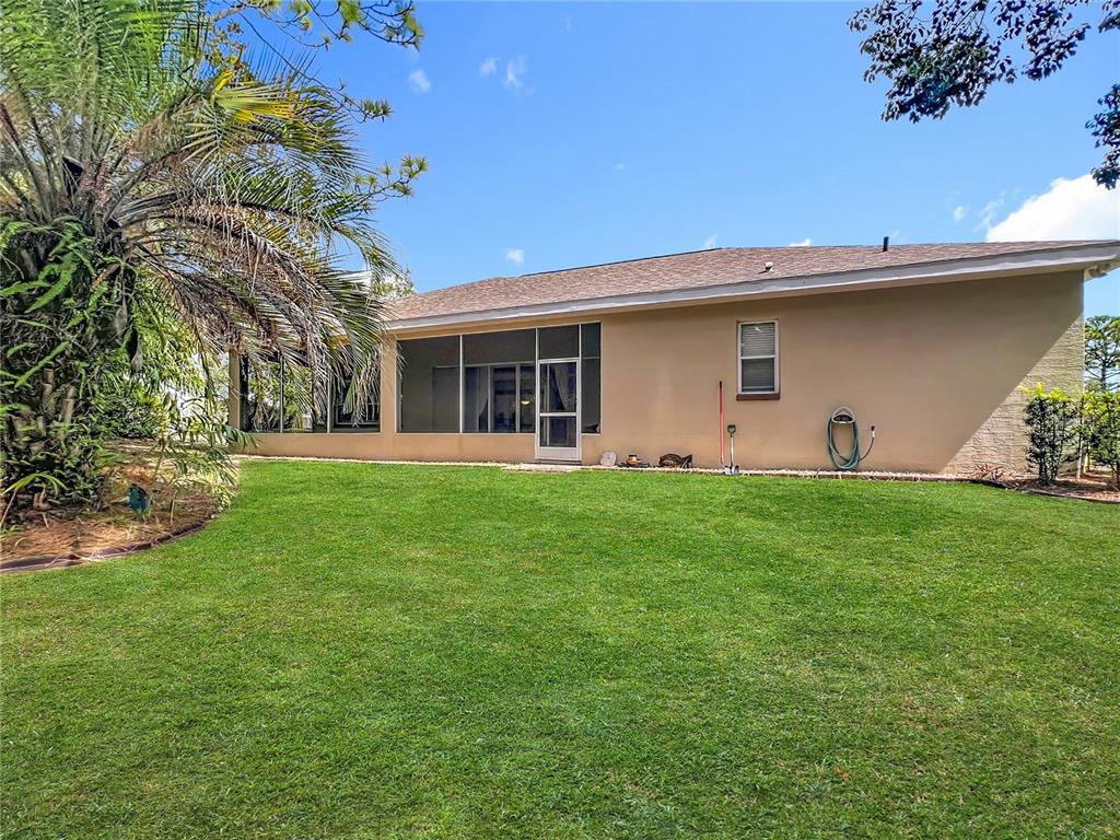 17 Sweetbay Court Homosassa, FL 34446 - Photo 53 of 61 a front view of house with yard and green space