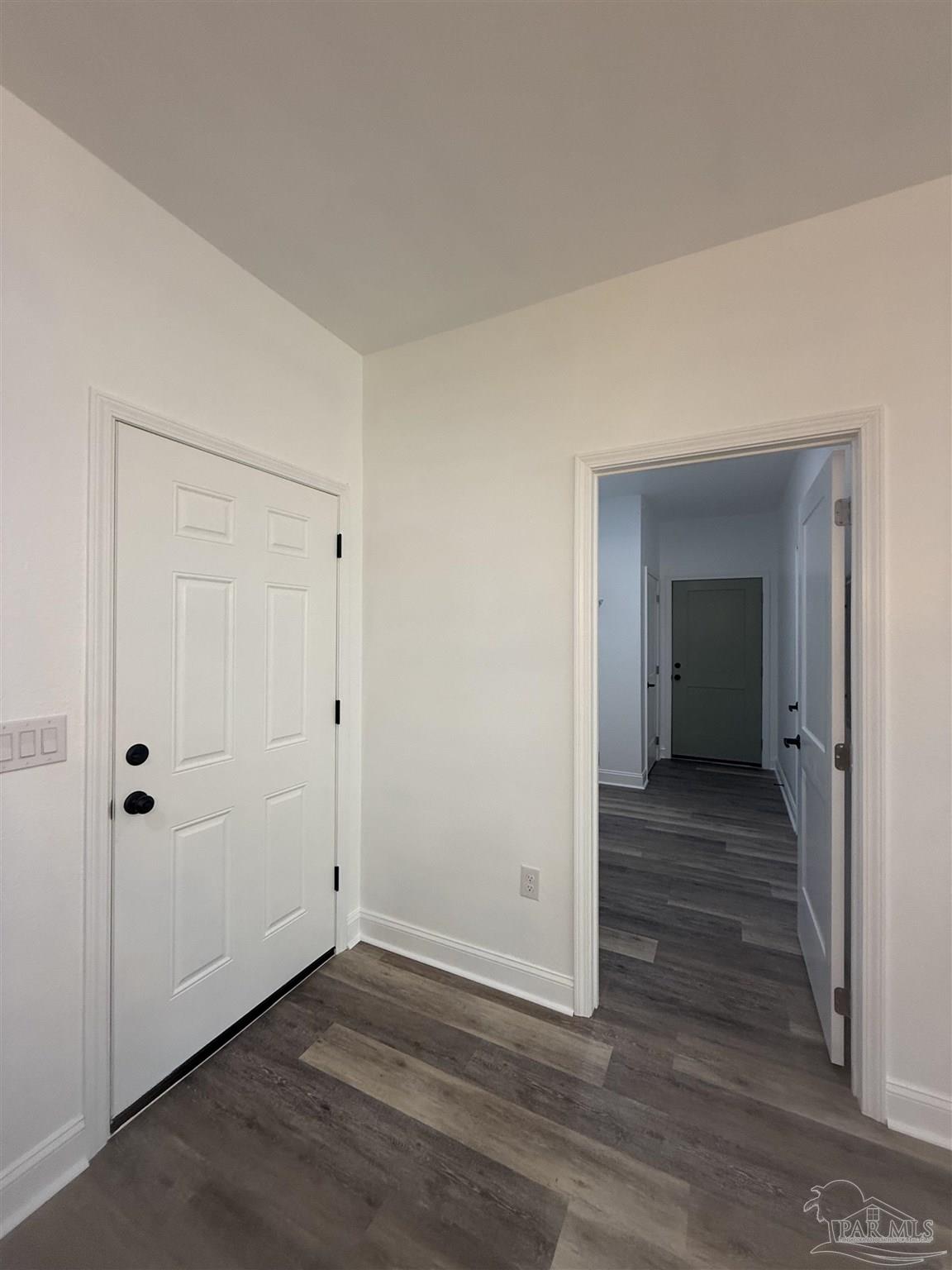 4035 Charles Circle Pace, FL 32571 - Photo 19 of 68 a view of a hallway with wooden floor