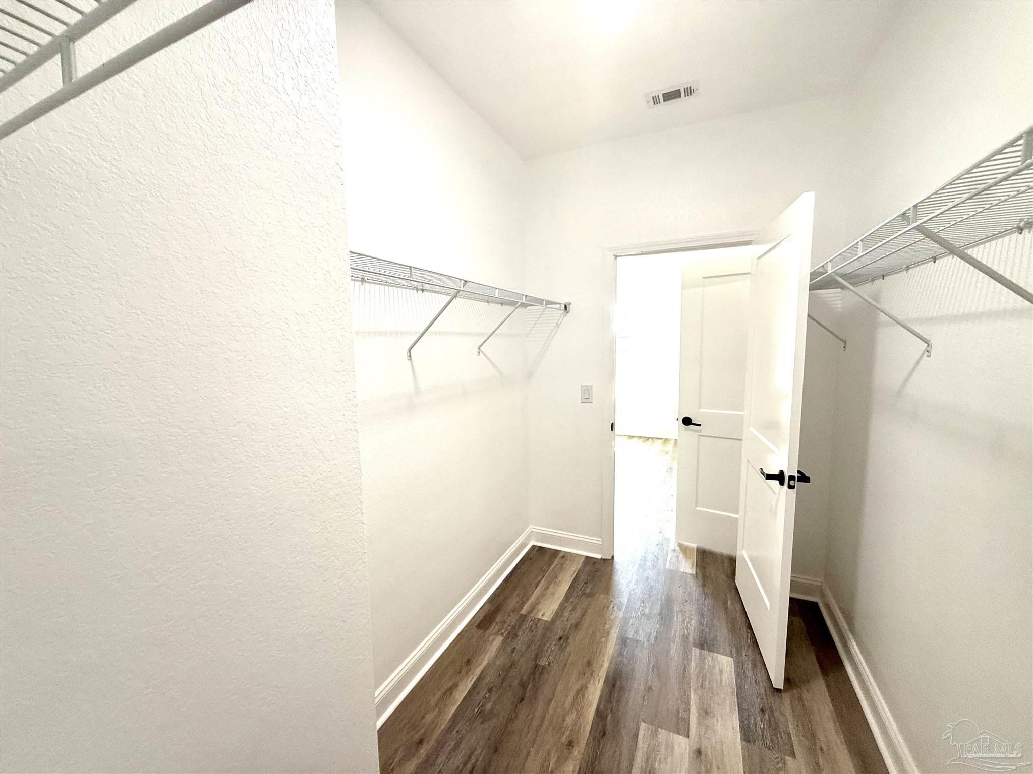 4035 Charles Circle Pace, FL 32571 - Photo 33 of 68 a bathroom with a shower and a sink