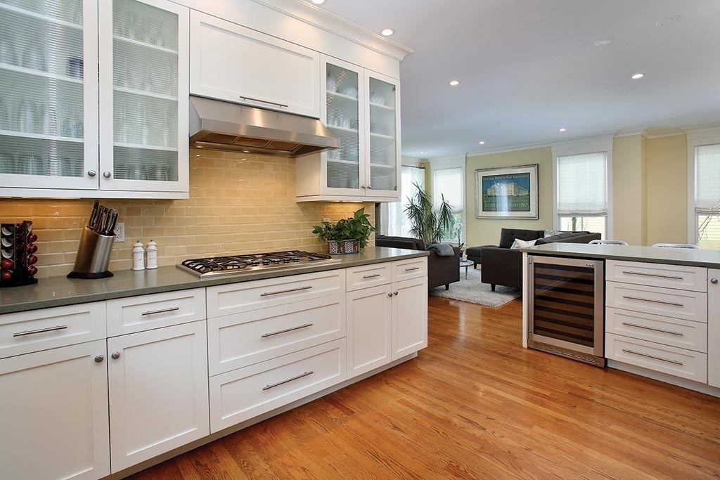 107 Manet Road Newton, MA 02467 - Photo 2 of 10 a kitchen with stainless steel appliances granite countertop a stove and a sink