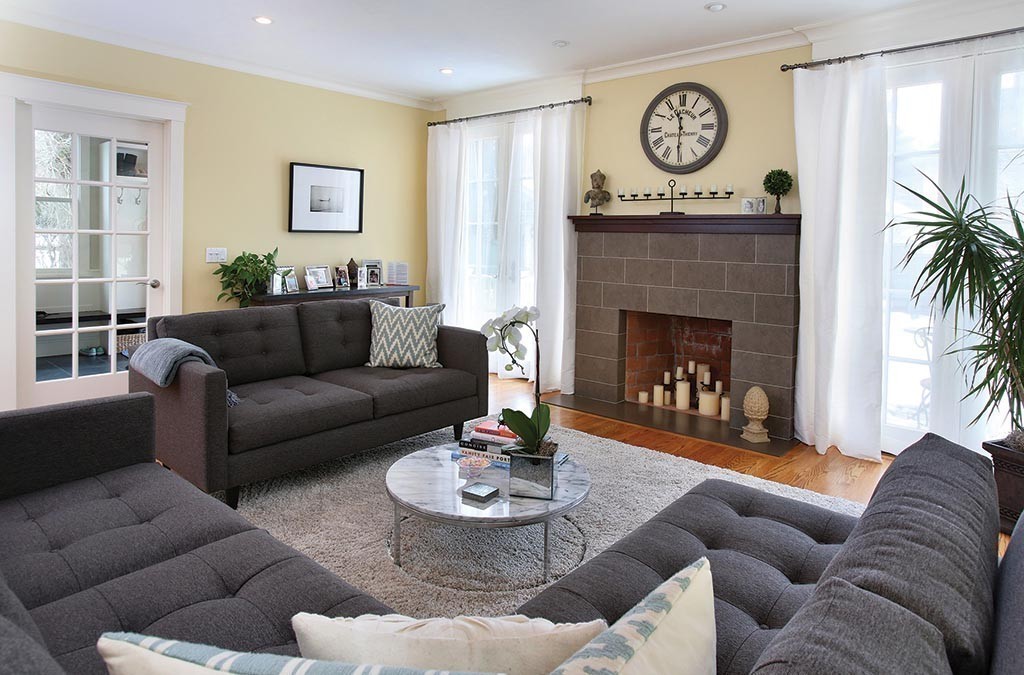 107 Manet Road Newton, MA 02467 - Photo 4 of 10 a living room with furniture and a fireplace