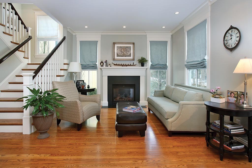107 Manet Road Newton, MA 02467 - Photo 5 of 10 a living room with furniture and a fireplace