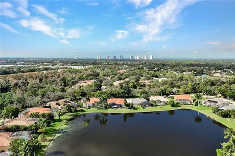 an aerial view of a city with lots of residential buildings