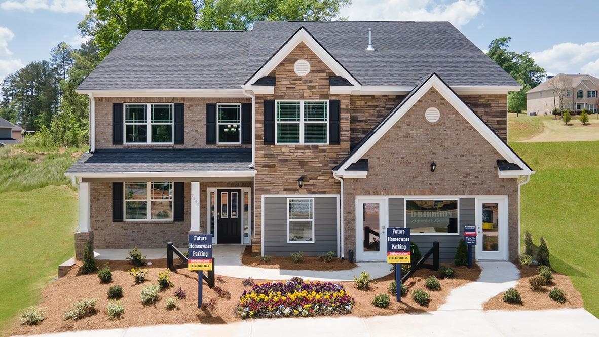 427 Beachview Road, Unit 38 Hampton, GA 30228 - Photo 1 of 1 a view of a house with sitting area and garden