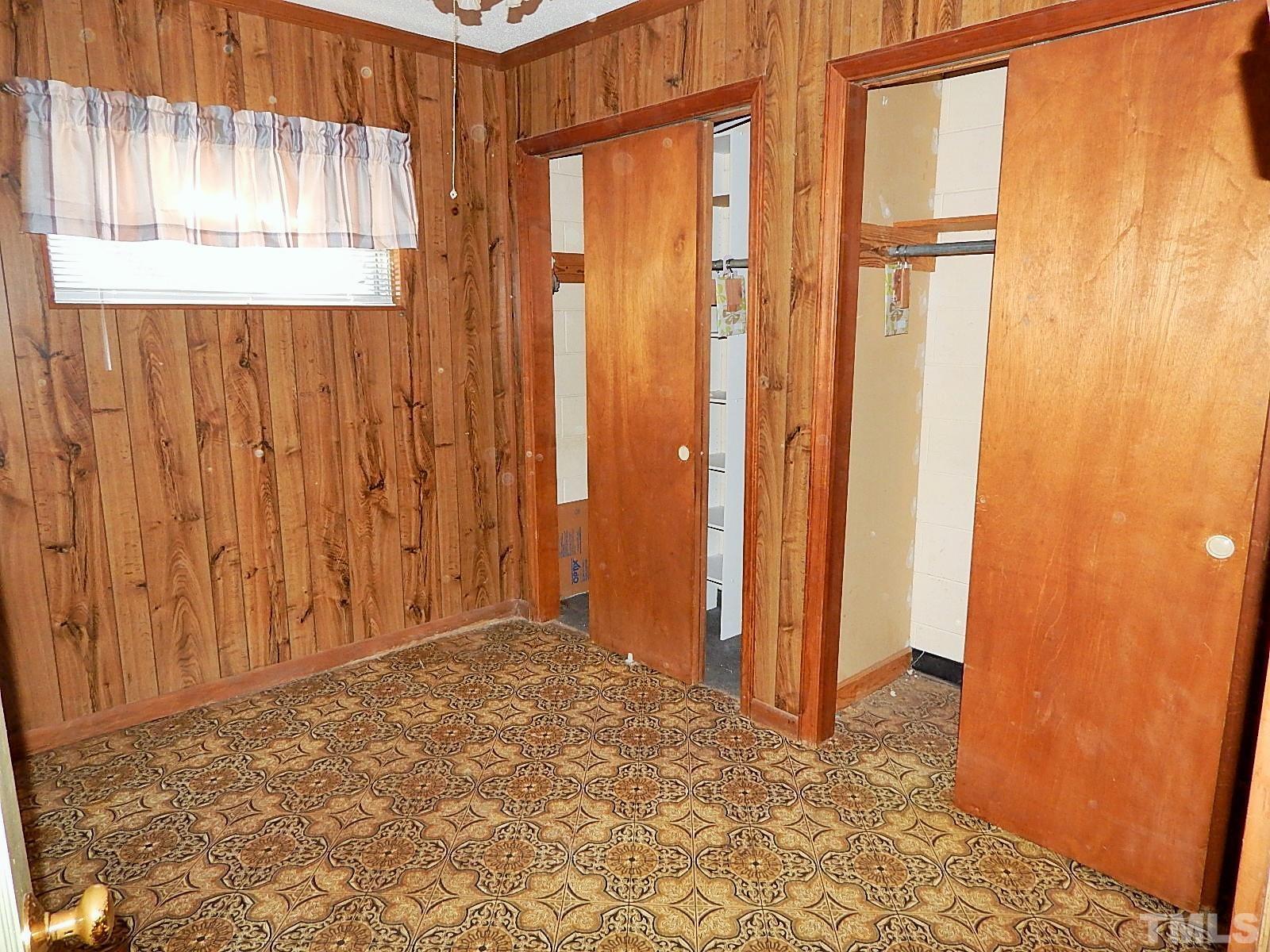 3914 Cheek Road Durham, NC 27704 - Photo 11 of 15 a view of an empty room with a window