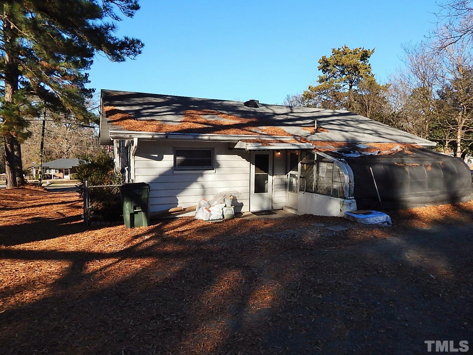 3914 Cheek Road Durham, NC 27704 - Photo 4 of 15 a view of a street with houses