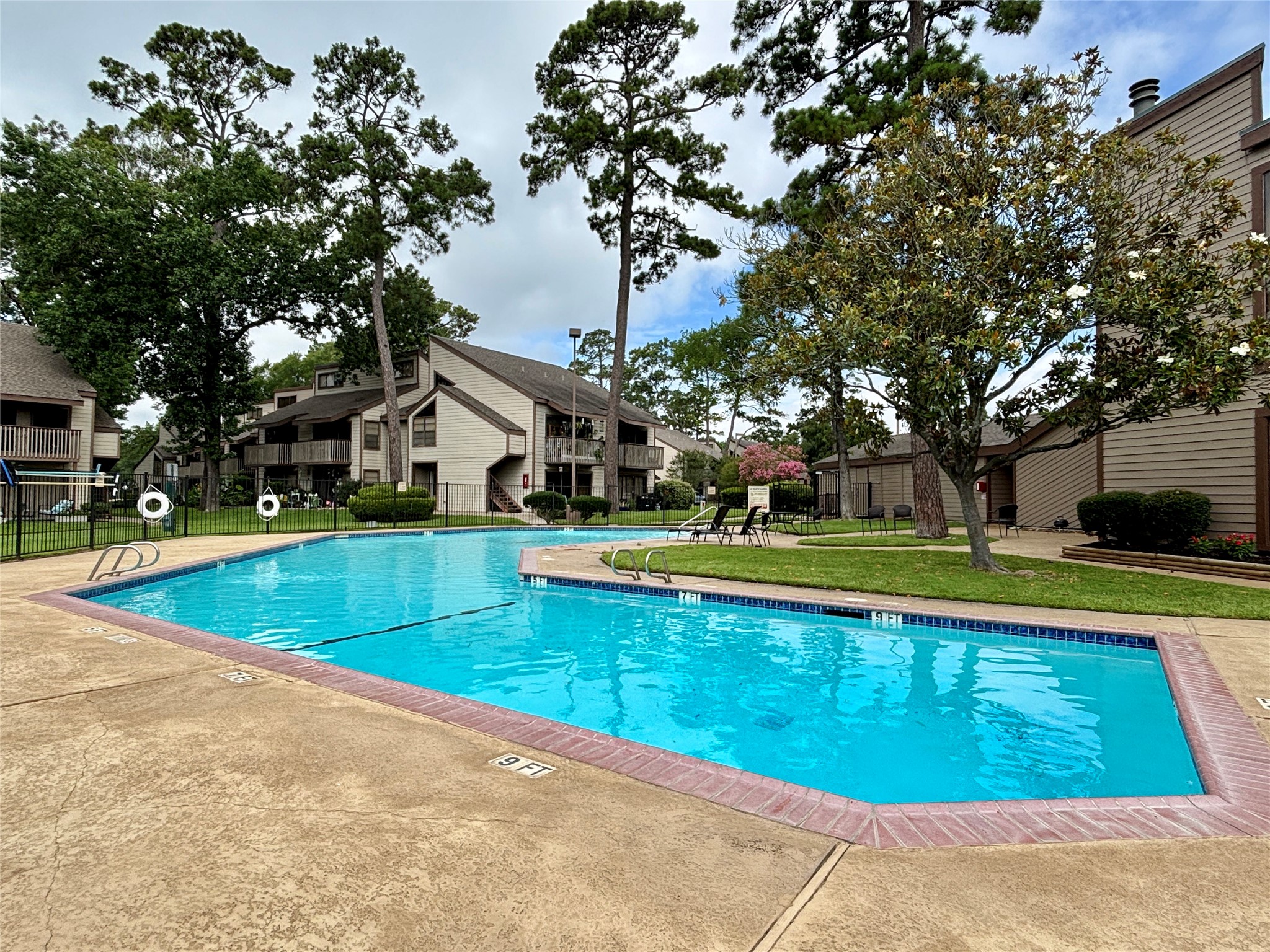 12900 Walden Road, Unit 508E Montgomery, TX 77356 - Photo 25 of 25 a view of a house with swimming pool