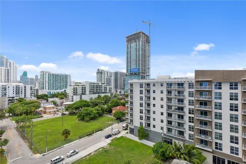 a view of a city with tall buildings