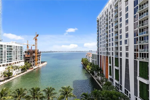 a view of a lake with a building