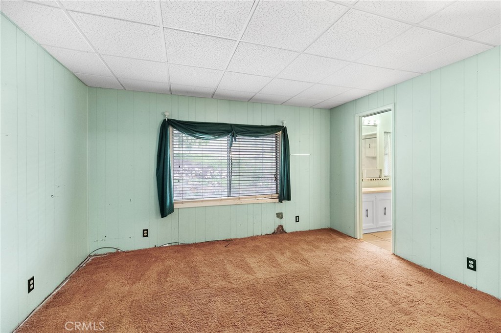 24469 Manzanita Road Menifee, CA 92584 - Photo 15 of 20 a view of an empty room with a window
