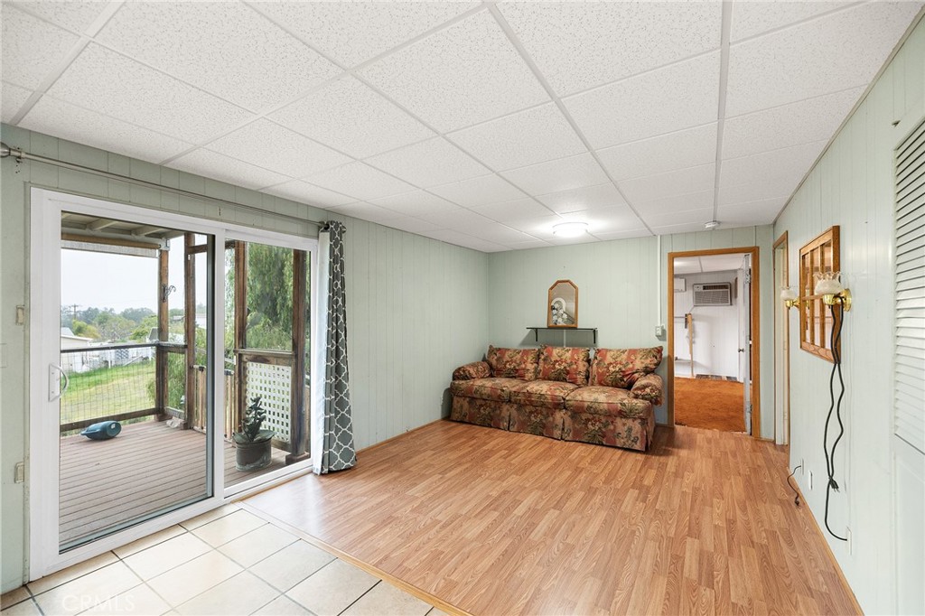 24469 Manzanita Road Menifee, CA 92584 - Photo 6 of 20 a bedroom with furniture and large window