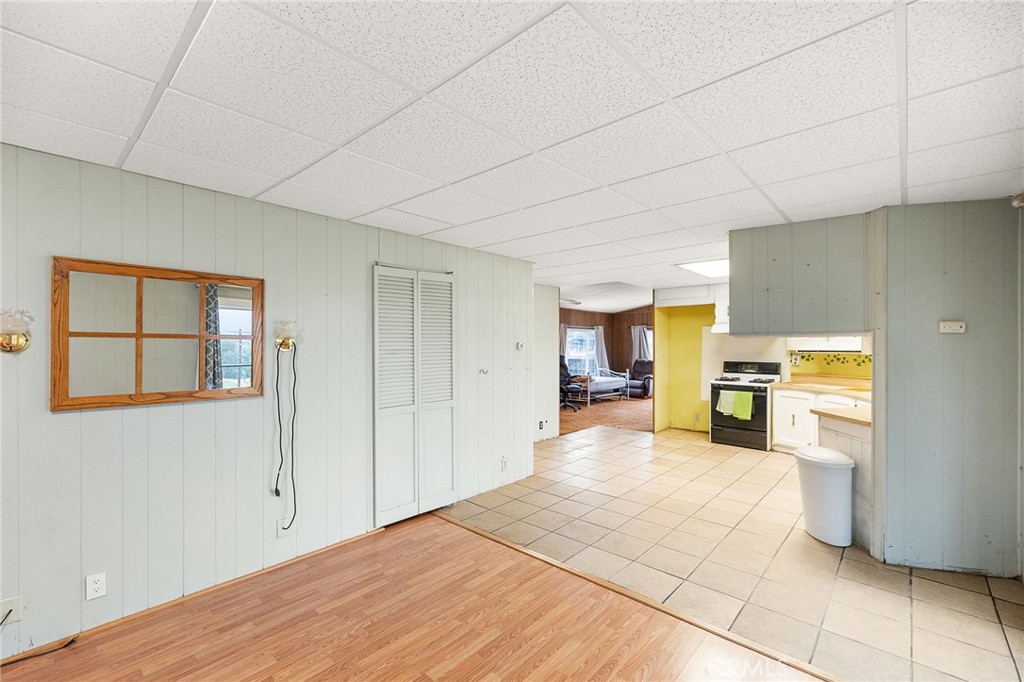 24469 Manzanita Road Menifee, CA 92584 - Photo 7 of 20 a view of a kitchen with furniture and a kitchen
