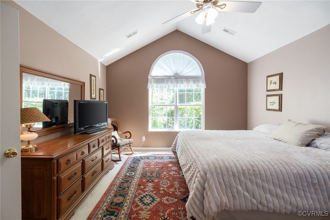 1314 Tannery Circle Midlothian, VA 23113 - Photo 18 of 25 a bedroom with a bed and a flat screen tv