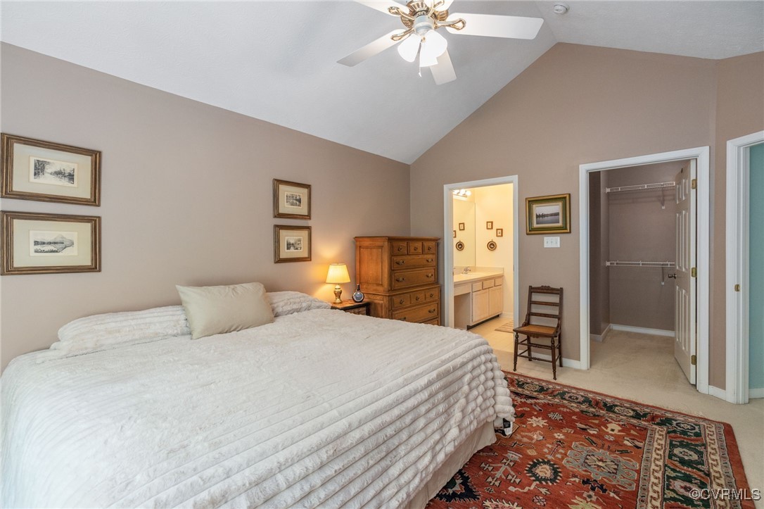 1314 Tannery Circle Midlothian, VA 23113 - Photo 19 of 25 a bedroom with a bed and a chandelier