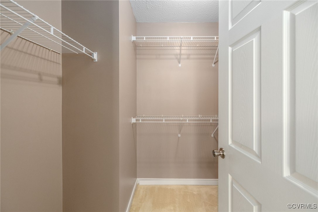 1314 Tannery Circle Midlothian, VA 23113 - Photo 20 of 25 a bathroom with a glass shower door