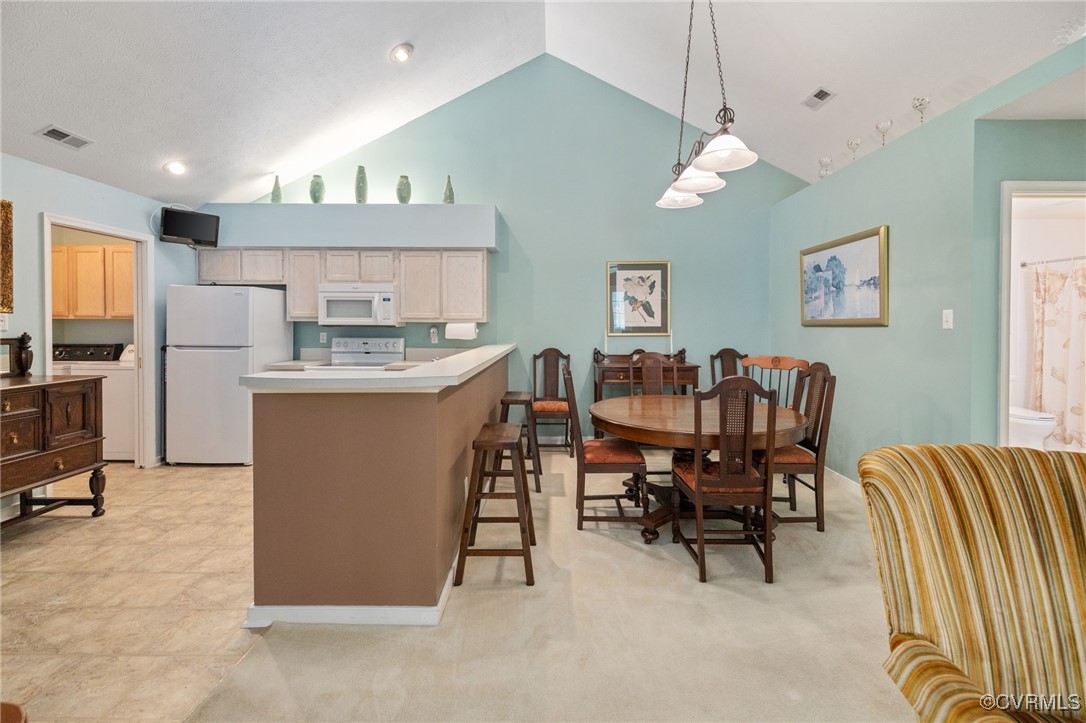 1314 Tannery Circle Midlothian, VA 23113 - Photo 22 of 25 a room with stainless steel appliances kitchen island granite countertop furniture and a refrigerator