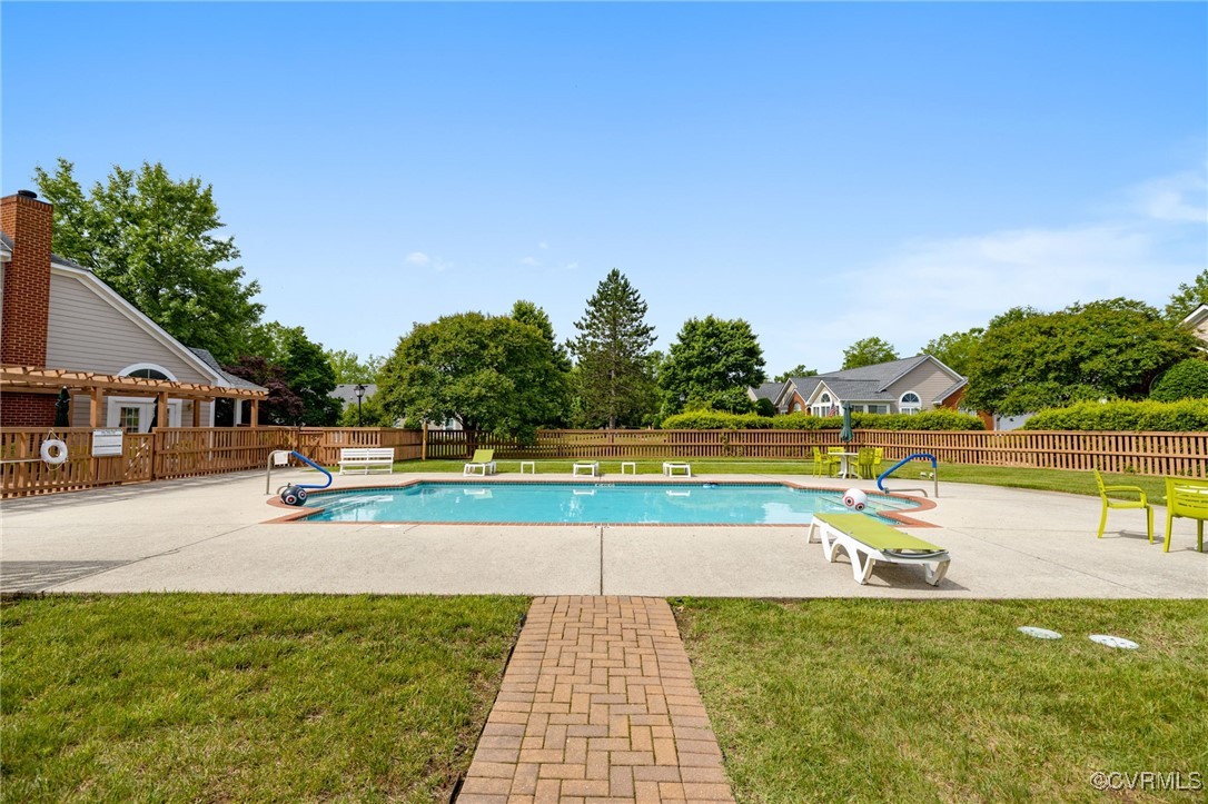 1314 Tannery Circle Midlothian, VA 23113 - Photo 3 of 25 a view of a swimming pool with a patio and a yard