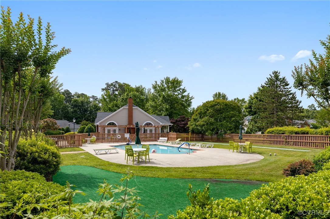 1314 Tannery Circle Midlothian, VA 23113 - Photo 4 of 25 a swimming pool with wooden fence