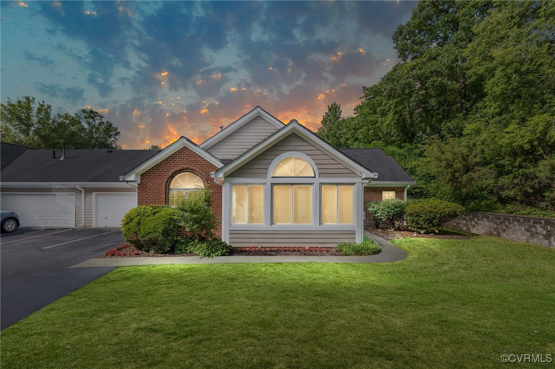 1314 Tannery Circle Midlothian, VA 23113 - Photo 5 of 25 a front view of a house with a yard