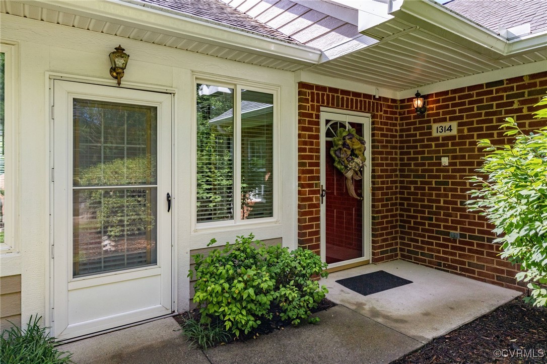 1314 Tannery Circle Midlothian, VA 23113 - Photo 8 of 25 a front view of a house with a yard