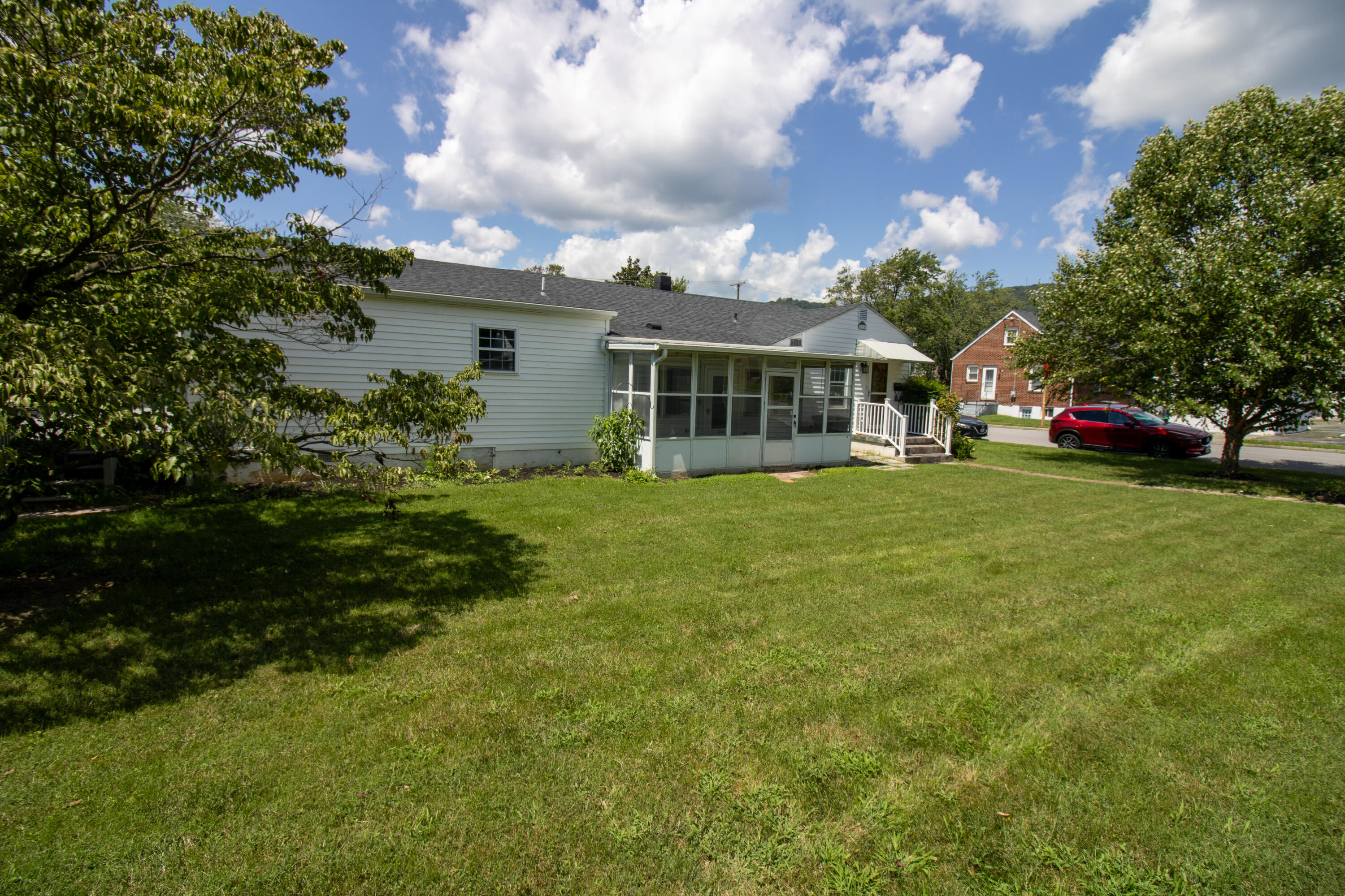 216 Goodwin Avenue Salem, VA 24153 - Photo 5 of 25 a view of a house with yard and sitting area