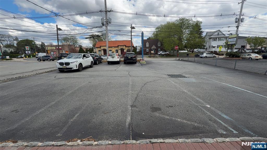 351 Main Avenue Wallington, NJ 07057 - Photo 3 of 9 a view of parking space and a cars parked on the road
