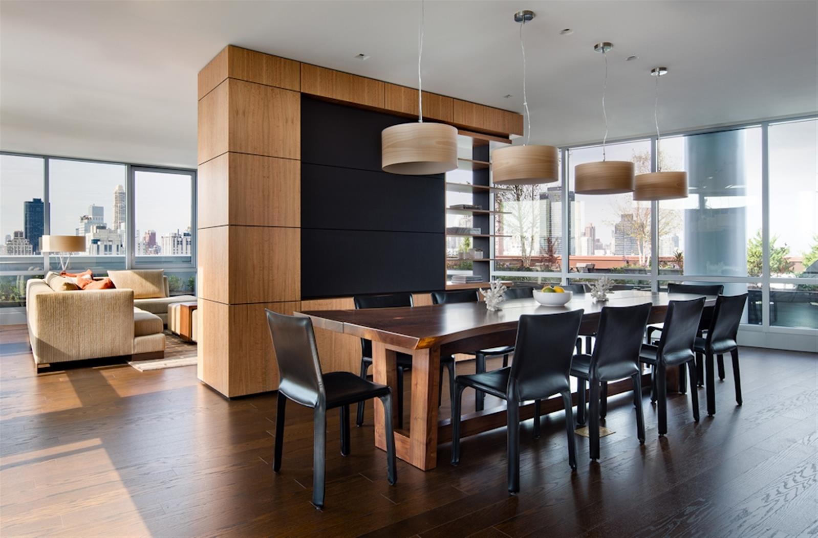480 Main Street, Unit 20J Manhattan, NY 10044 - Photo 4 of 17 a view of a dining room with furniture and wooden floor