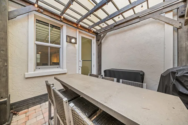 a view of swimming pool with chairs