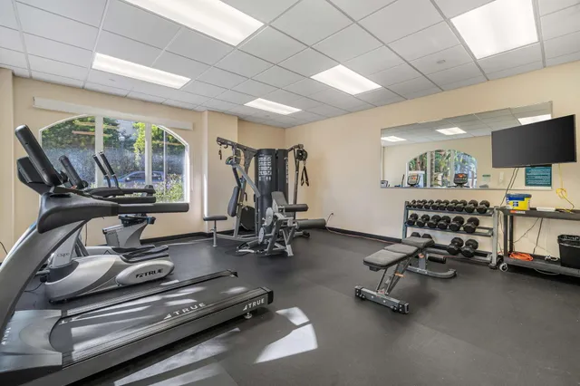 a view of a room with gym equipment