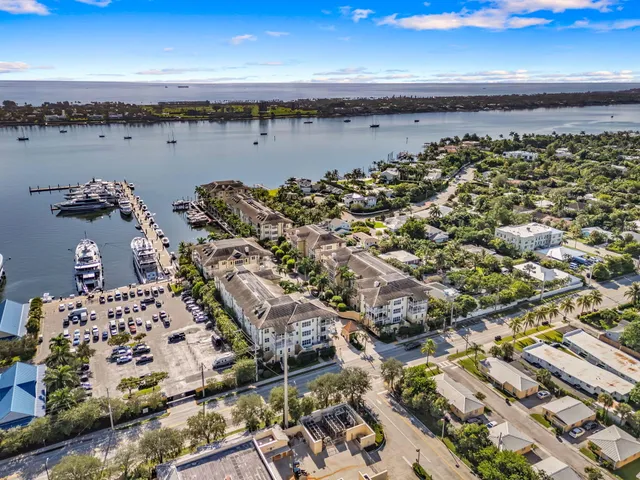 an aerial view of residential building with ocean view