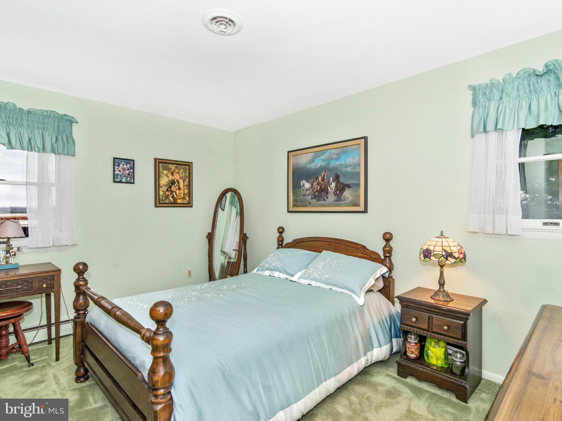 14040 Liberty Road Union Bridge, MD 21791 - Photo 15 of 30 a bed room with a bed and a desk
