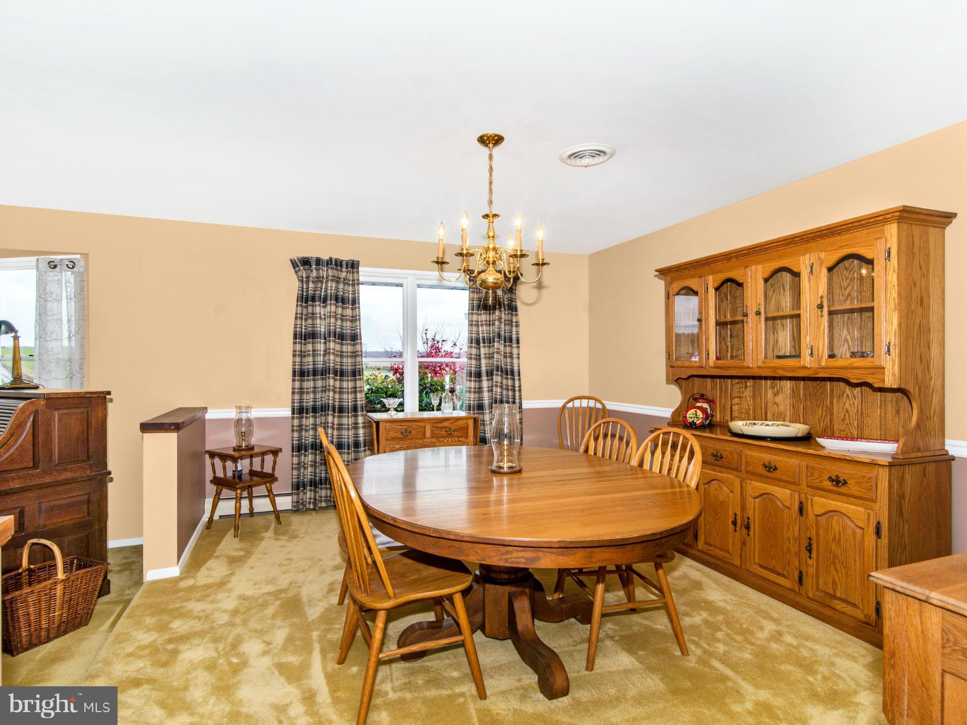 14040 Liberty Road Union Bridge, MD 21791 - Photo 5 of 30 a dining room with furniture and a chandelier