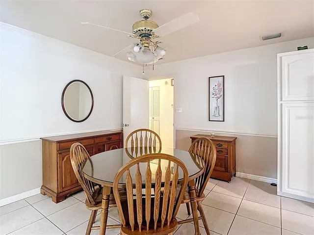 a living room with furniture wooden floor and a flat screen tv