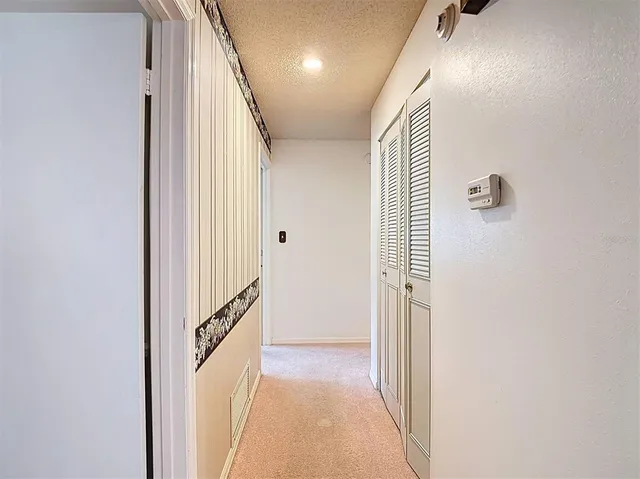 a bathroom with a bathtub and a window