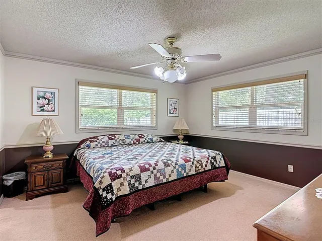 a bathroom with a sink a mirror and a shower