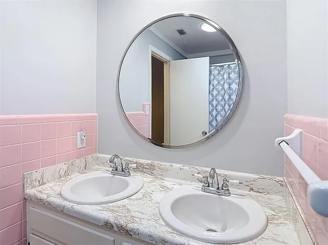 a backyard of a house with yard barbeque oven and outdoor seating