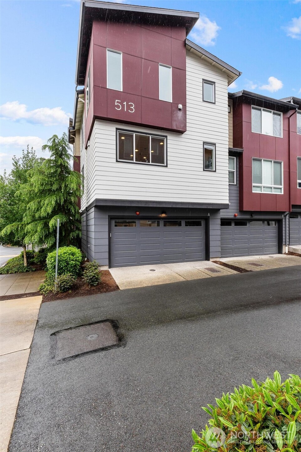 513 238th Street Southeast, Unit A Bothell, WA 98021 - Photo 2 of 31 a view of a house with a street