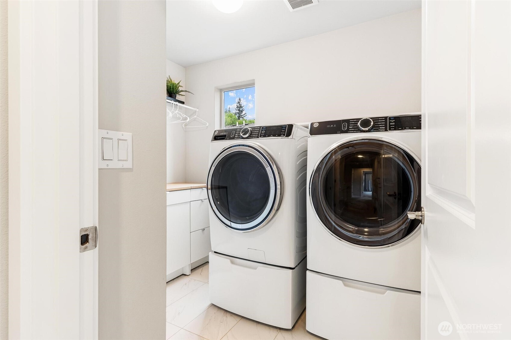 513 238th Street Southeast, Unit A Bothell, WA 98021 - Photo 28 of 31 a utility room with dryer and washer